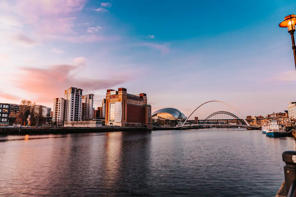 Newcastle Quayside at dusk Newcastle and Gateshead quaysides at dusk with bridges across the River Tyne